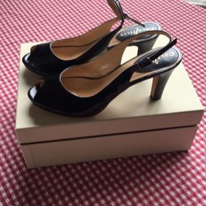 Cole Haan black patent sling backs.